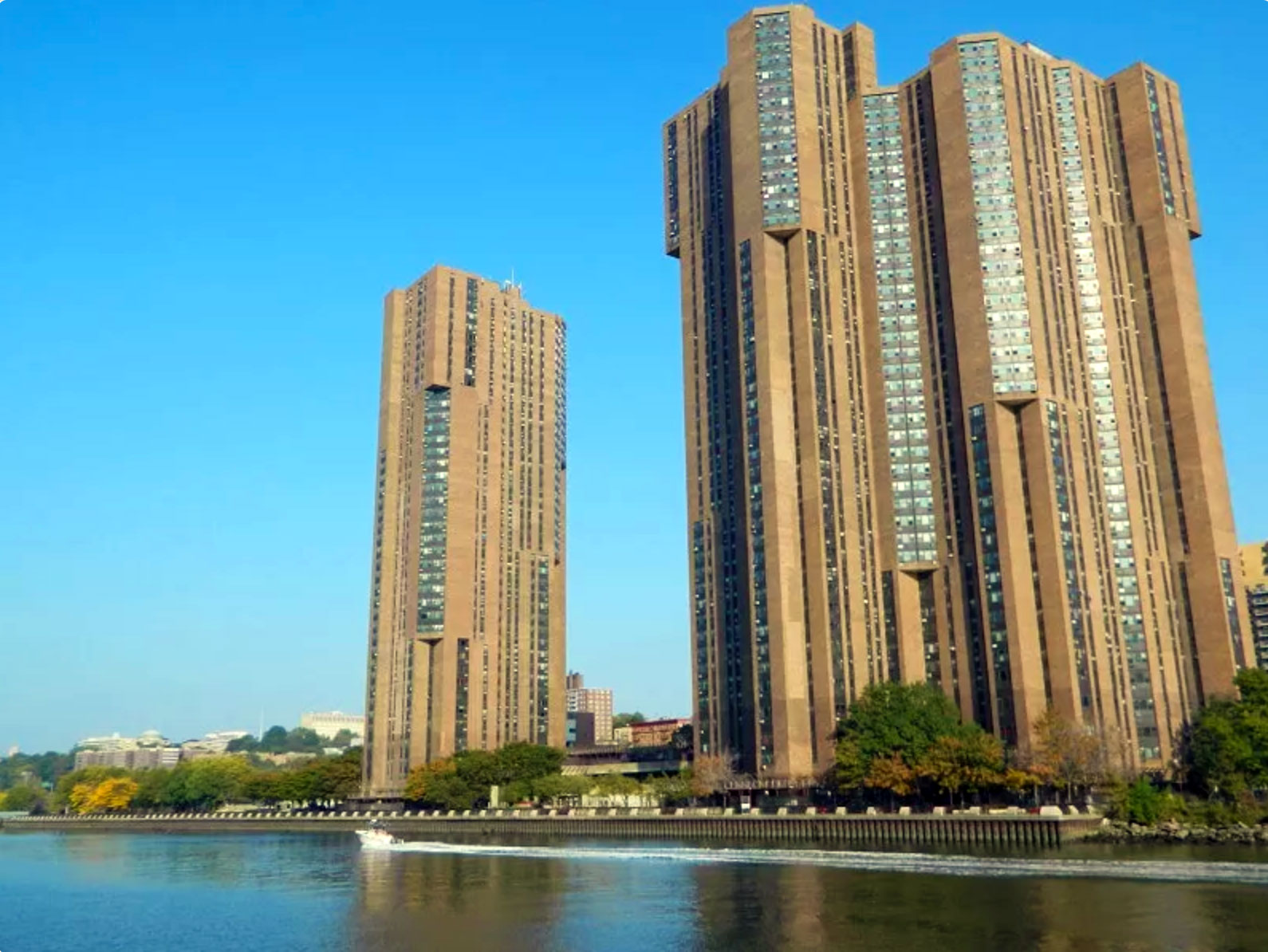 A photo of River Park Towers in Bronx New York as seen from the East River.